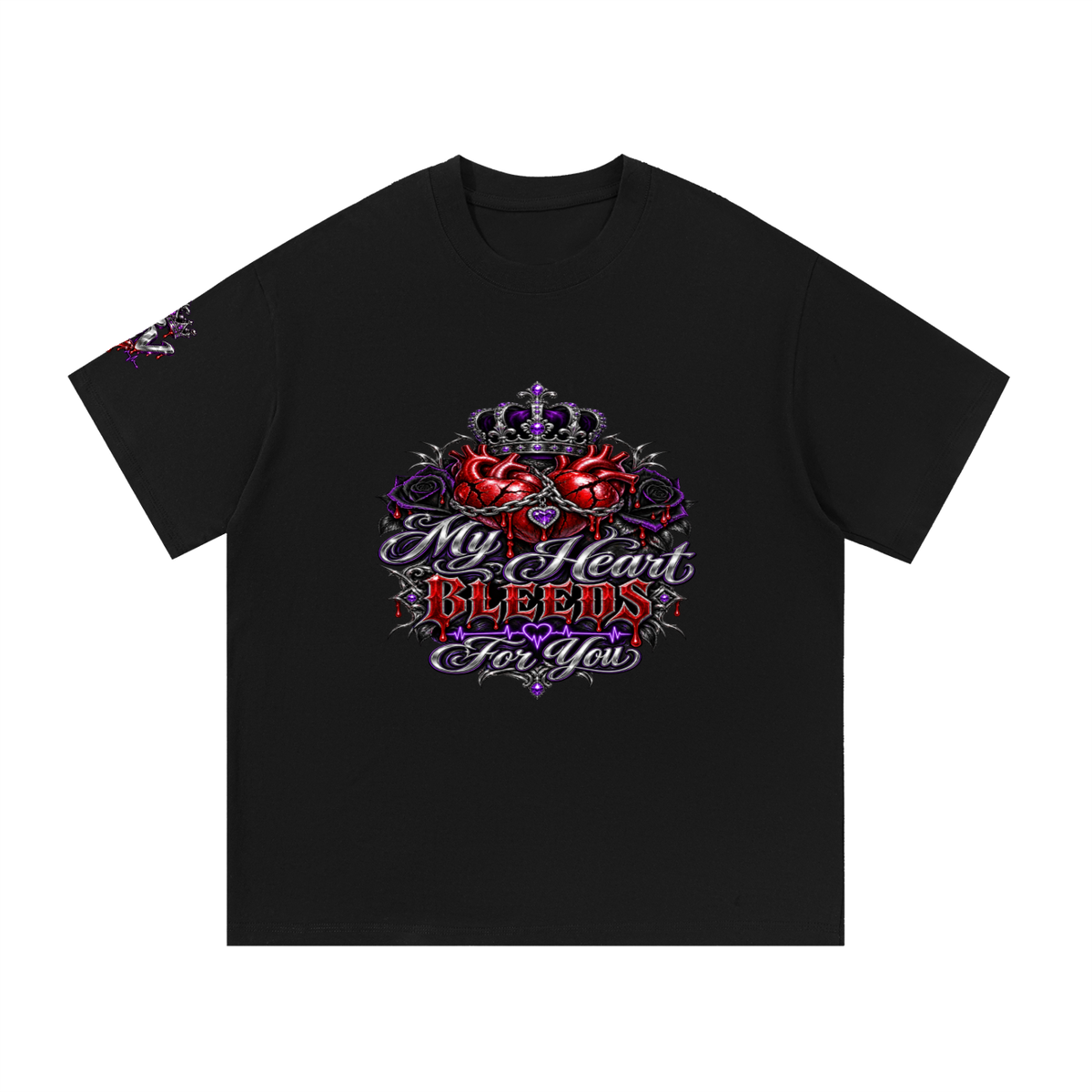 A black short-sleeve crewneck t-shirt featuring a detailed graphic on the chest of a red heart, a purple crown, and the text 'My Heart BLEEDS For You' in stylized white and red lettering.