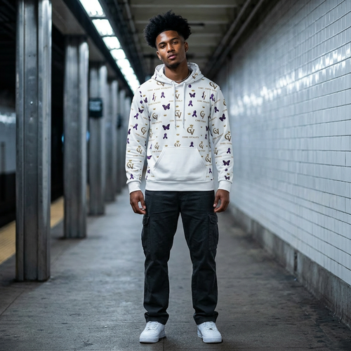 Person wearing a white hoodie with butterfly pattern in an urban setting