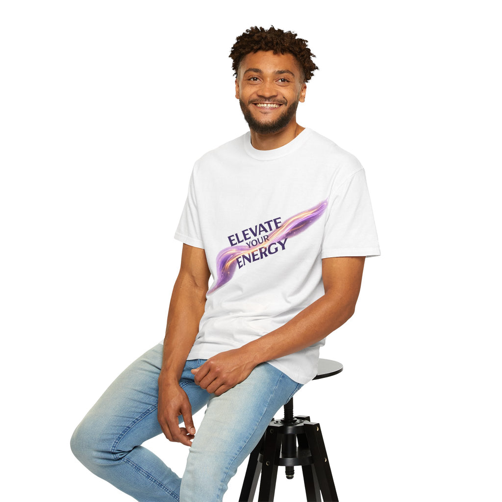 Man sitting on a stool wearing a white t-shirt with 'Why So Serious?' text.