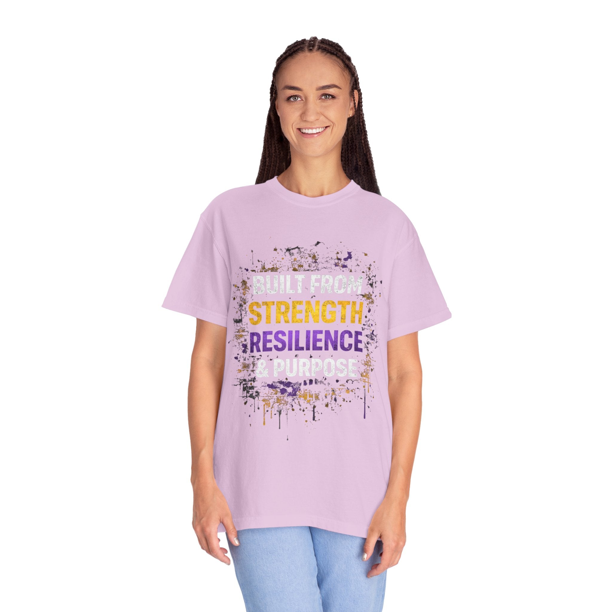 Person wearing a purple t-shirt with motivational text on a white background