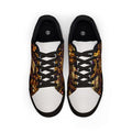 Pair of sneakers with leopard print laces on a white background